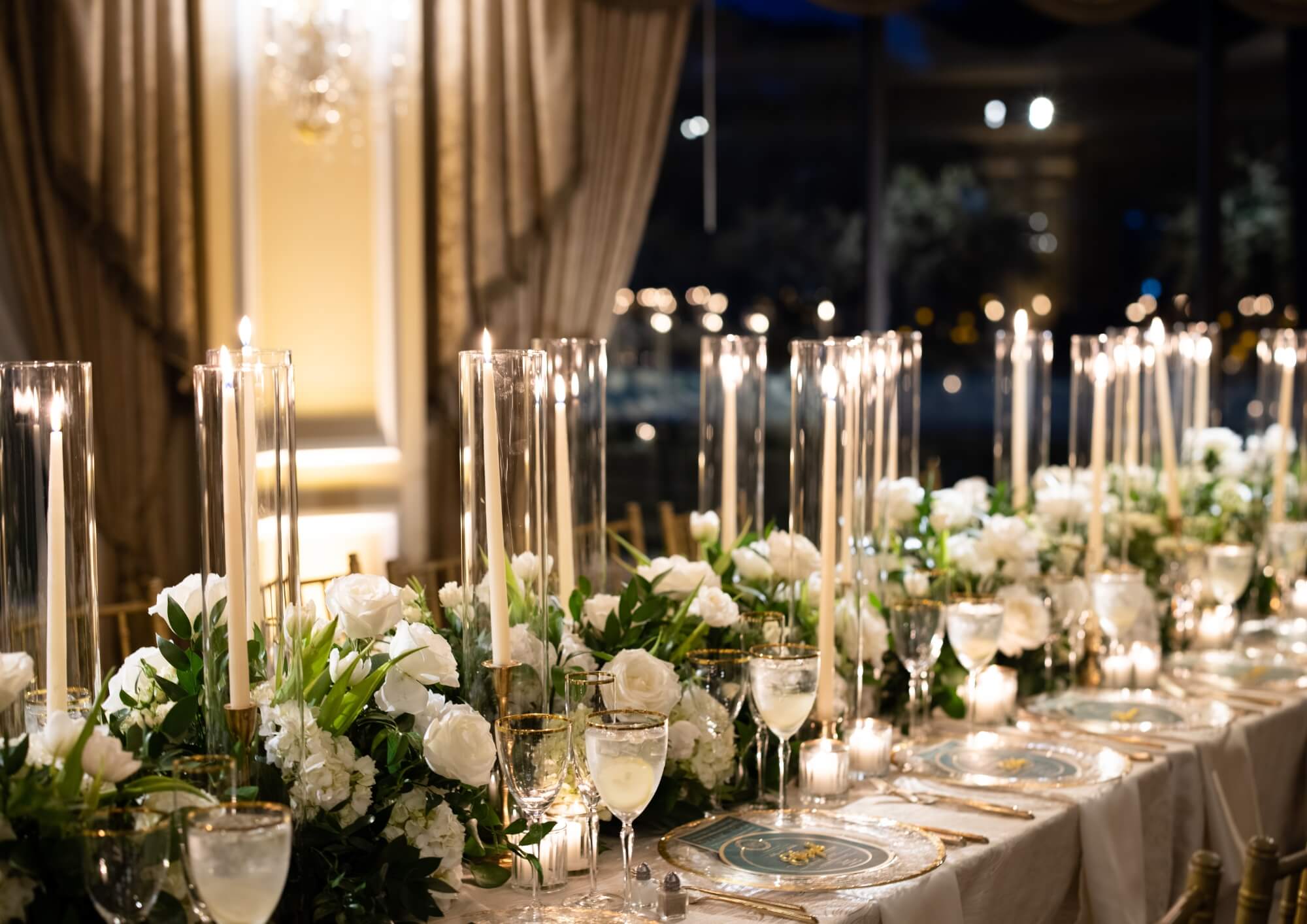 Wedding accessories. Tall candles on a table